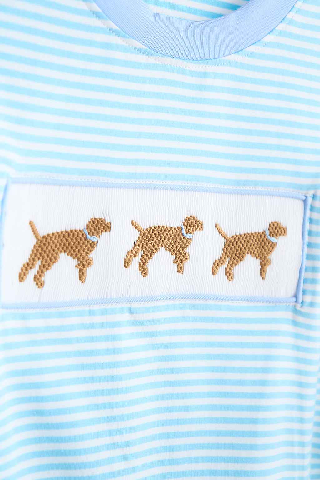 Blue puppy hand smocked stripe top