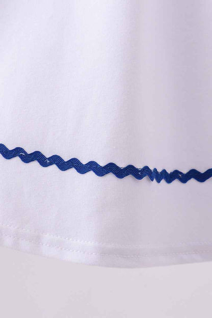 White flag smocked ruffle dress